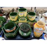 A collection of Eichwald pottery including three plant pots on a stand, vases etc Condition