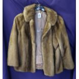 A short light brown fur jacket Condition Report: Available upon request