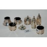 A lot comprising a six piece silver condiment set, Birmingham 1959, 148gms and an EP salt