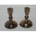 A pair of silver candlesticks, Birmingham 1990, weighted, 13.5cm high Condition Report: Available