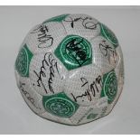 A Celtic FC leather football bearing numerous player autographs Condition Report: Available upon