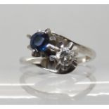 An 18ct white gold retro sapphire and diamond ring, size M1/2, diamond estimated approx 0.18ct,