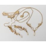Pat Cheney 9ct gold brooch, with similar earrings and pendant necklet all with fresh water pearls,