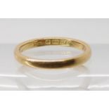 An 18ct gold wedding ring, size N1/2, weight 2.8gms Condition Report: Interior inscribed, edges worn