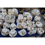 A extensive Royal Worcester Evesham dinner service comprising thirteen 26cm plates, fourteen 21cm