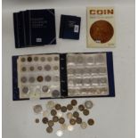 A lot comprising four albums of mainly GB coins including some pre '47 coin with some loose coins