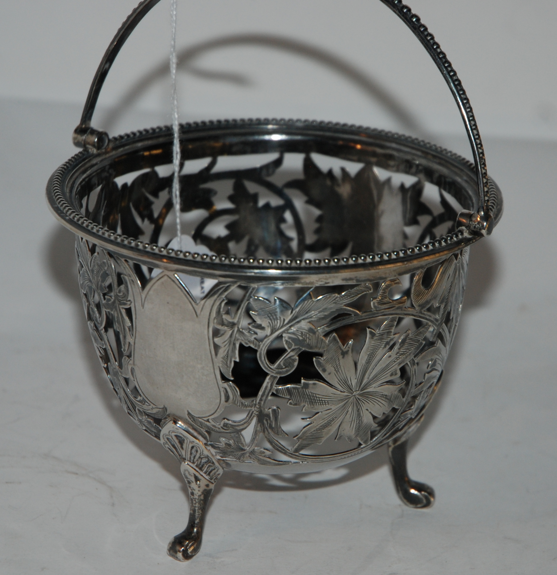 A Victorian silver sugar basket, London 1872 lacking glass liner, 10cm high, 245gms Condition - Image 2 of 2