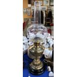 A brass oil lamp Condition Report: Available upon request