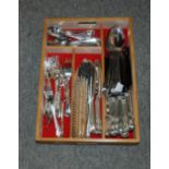A lot comprising two cutlery trays of loose cutlery, enamel dressing table set etc Condition Report: