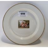 A continental porcelain plate with central painted panel of cherubs, 17cm diameter Condition Report: