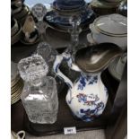 Pressed glass and other decanters and a pottery jug Condition Report: Not available for this lot