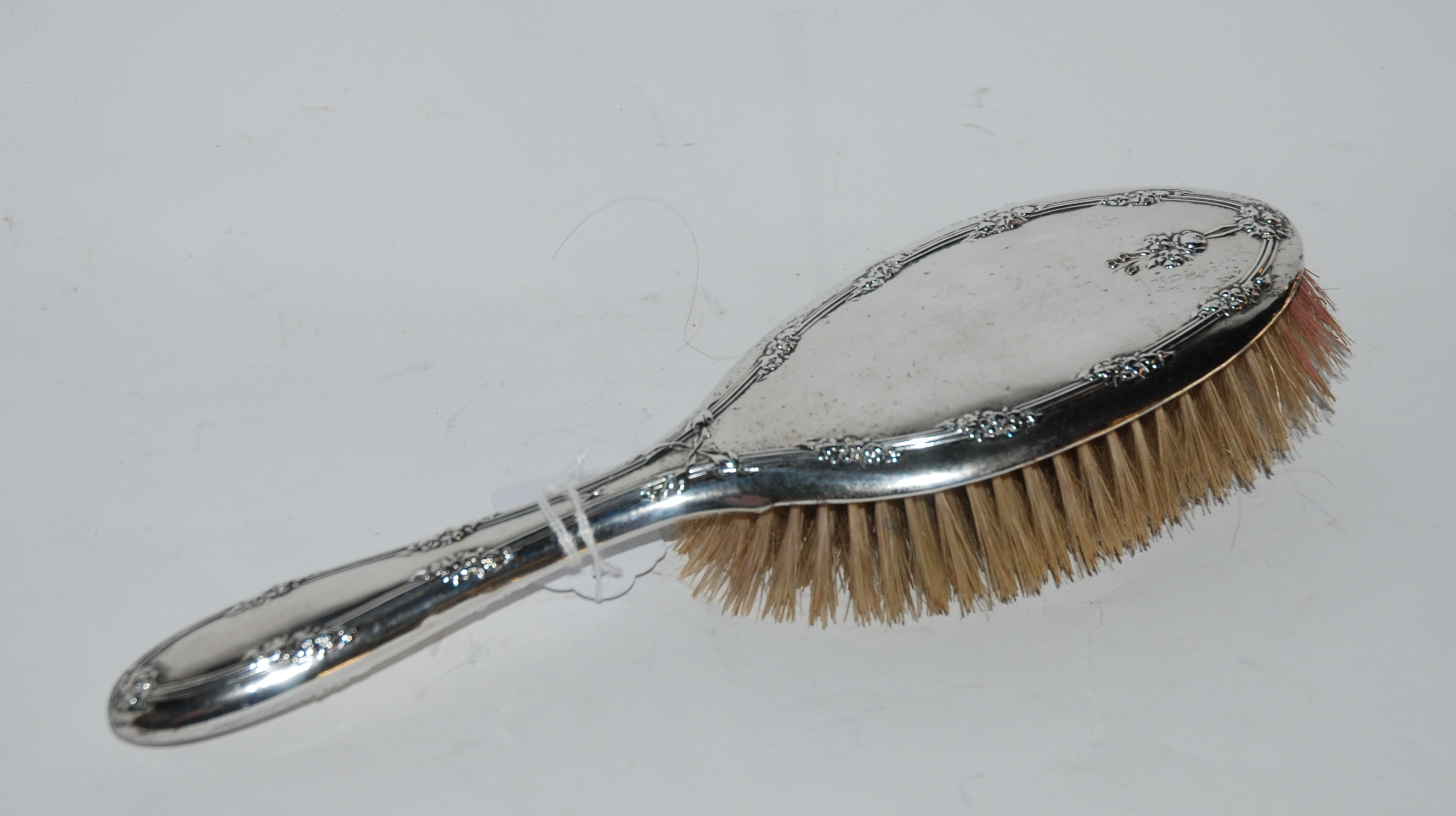 A silver backed dressing table brush, Birmingham 1938 Condition Report: Available upon request