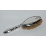 A silver backed dressing table brush, Birmingham 1938 Condition Report: Available upon request
