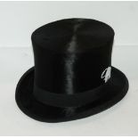 A black top hat, 20 x 16cm in cardboard case Condition Report: Available upon request