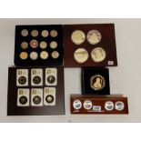 A lot comprising five cased coin sets including gold plated cupronickel coins Condition Report: