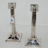 A pair of silver plated candlesticks with reeded columns (converted to lamps), 28.5cm high Condition