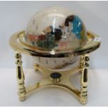 A small mother of pearl and hardstone globe of the world Condition Report: Available upon request