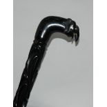 An ebony walking cane the handled modelled as an elephant, 90cm long (def) Condition Report:
