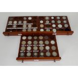 A mixed collection of mainly silver coins in three coin cabinet trays (49) Condition Report: