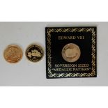 A UK gold proof sovereign 1995 with an Alderney Coronation Anniversary £25 gold coin 1993 and an