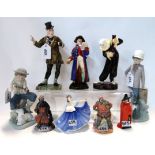 A Crown Staffordshire figure Mr Micawber, two Plant Tuscan figures Masquerade and Town Crier, four