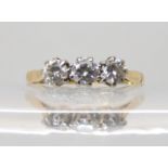 An 18ct gold three stone diamond ring, the three diamonds have an estimated approx total of 0.50cts,