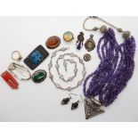 A silver and amethyst necklace, amber brooch and other items Condition Report: Not available for