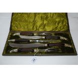 A cased five piece carving set Condition Report: Available upon request