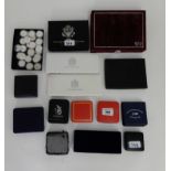 A collection of cased silver proof coin sets, some single proof coins and a quantity loose, fourteen