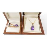 A 9ct gold amethyst and diamond accent pendant length 2.2cm, chain 60cm, together with a 9ct