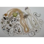 A silver locket and chain, silver chains, medallions, pendants and other items Condition Report: Not