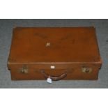 A large leather suitcase with W.C.F. initials, 68cm wide Condition Report: Available upon request