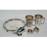 A lot comprising an EP salver, pair of salts, two tankards, sugar scuttle etc Condition Report: