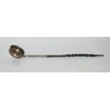 A silver bowled toddy ladle with whalebone handle, unclear London marks, 40cm long Condition Report: