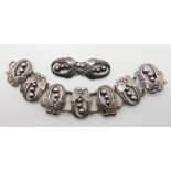 A Scandinavian style silver bracelet and matching brooch, bracelet stamped sterling Condition