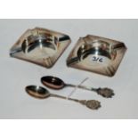 A lot comprising a pair of silver ahstrays, Birmingham 1946 and a pair of silver spoons, 125gms