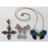 A silver and enamel Pat Cheney butterfly necklace, a mythical beasts brooch and a labradorite