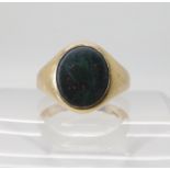 A 9ct gold gents bloodstone signet ring, size P, weight 9.3gms Condition Report: Available upon
