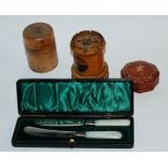 A Mauchline ware money box, cased butter knives etc Condition Report: Available upon request