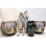 A pair of Victorian jardinieres painted with figures in rural settings (both drilled), a bisque