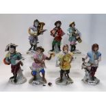 Seven Volkstedt 20th century porcelain monkey band figures Provenance - The Estate of the late Tom