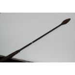 A tribal throwing spear, 123cm long Condition Report: Available upon request