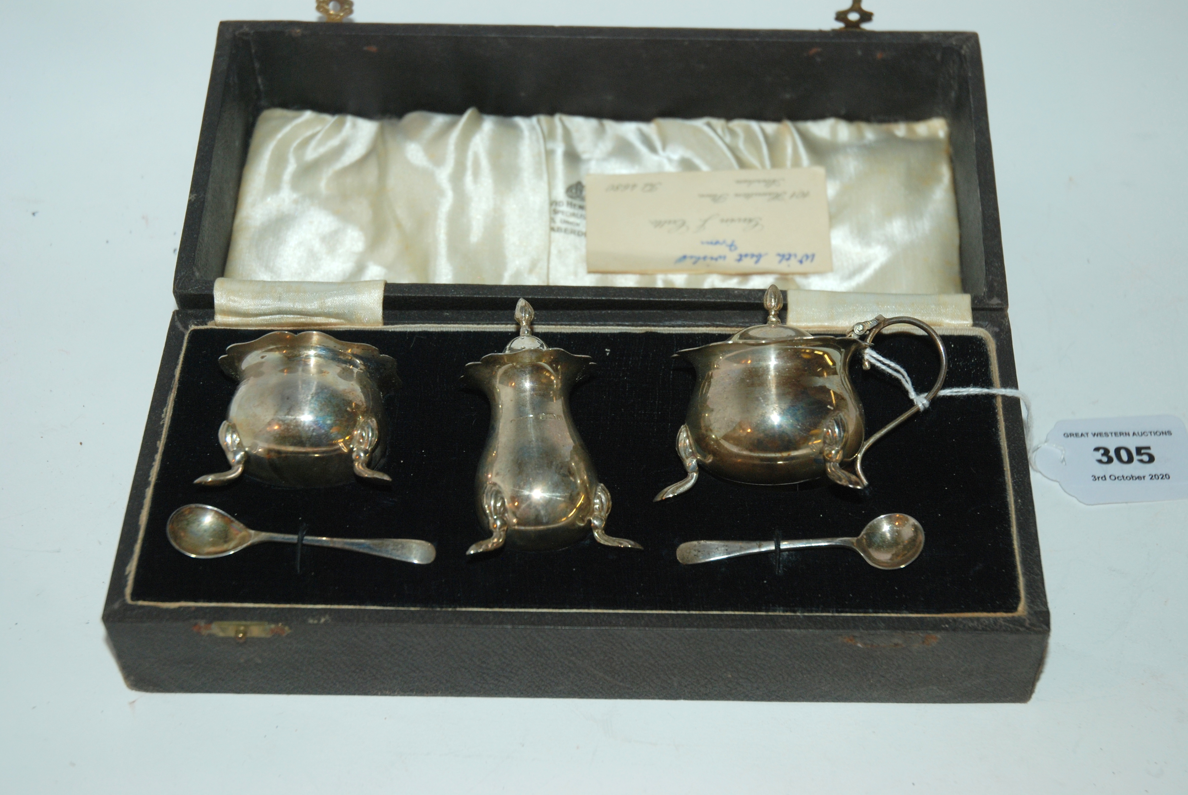 A cased three piece silver condiment set, Birmingham 1938 Condition Report: Available upon request