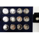 A cased silver twelve-coin collection Great Battles with a cased silver proof £1 coin Condition