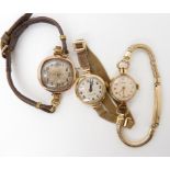 A 9ct gold Crusader ladies watch and strap weight including mechanism 15.2gms, together with two 9ct