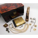 A Oriental lacquer box containing costume jewellery and a compact Condition Report: Not available