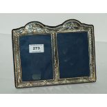 A duet silver-mounted photo frame, 17 x 22cm, apertures 12 x 8.5cm Condition Report: Available