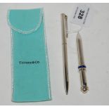 A lot comprising two Tiffany silver ballpoint pens, one in original case Condition Report: Available