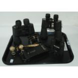 Three pairs of binoculars, two pairs of opera glasses and folding camera Condition Report: Available