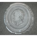 An oval plaster plaque cast with bust figure in relief, 50cm high Condition Report: Available upon